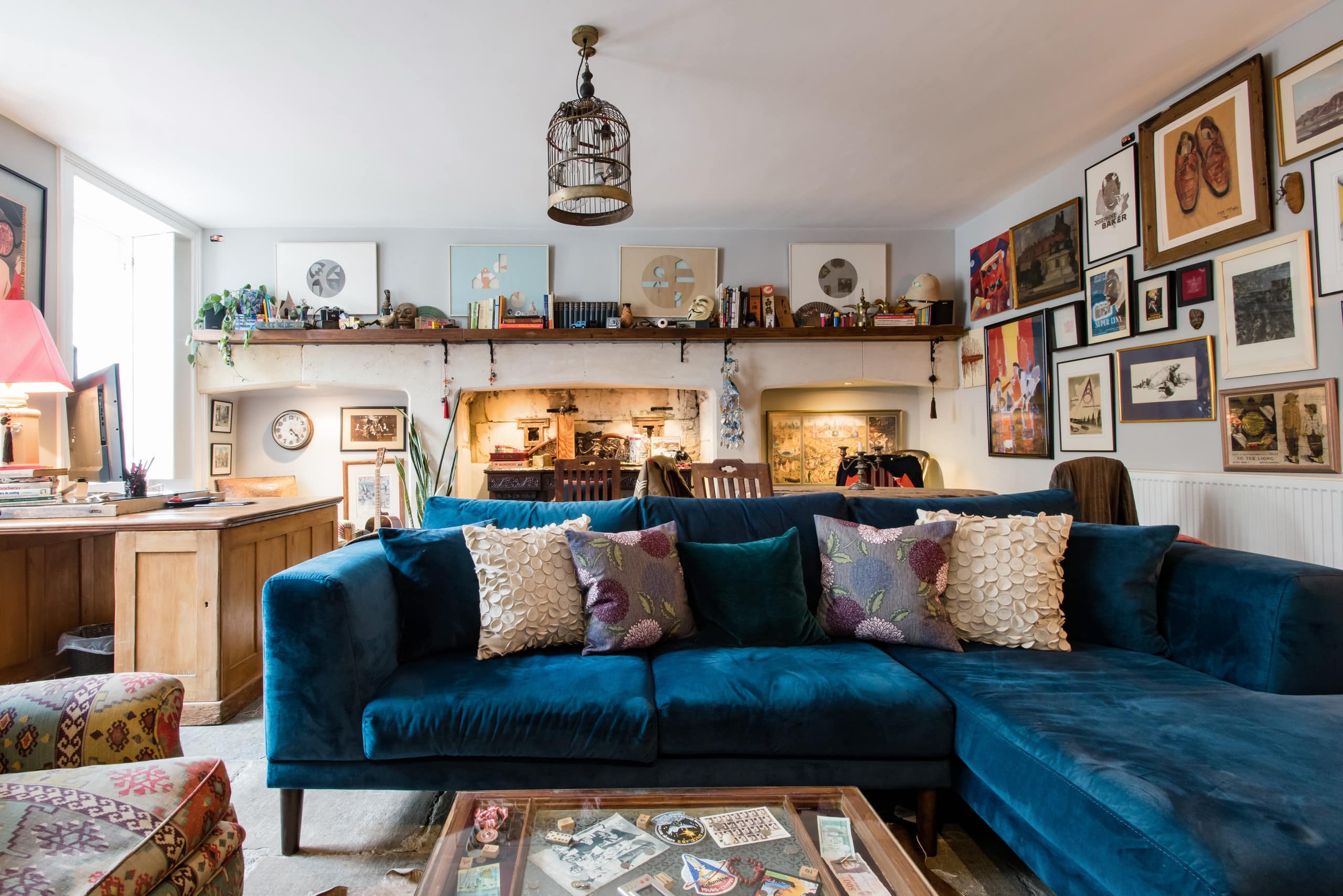 Blue velvet sofa and Georgian features in the courtyard apartment in Bath
